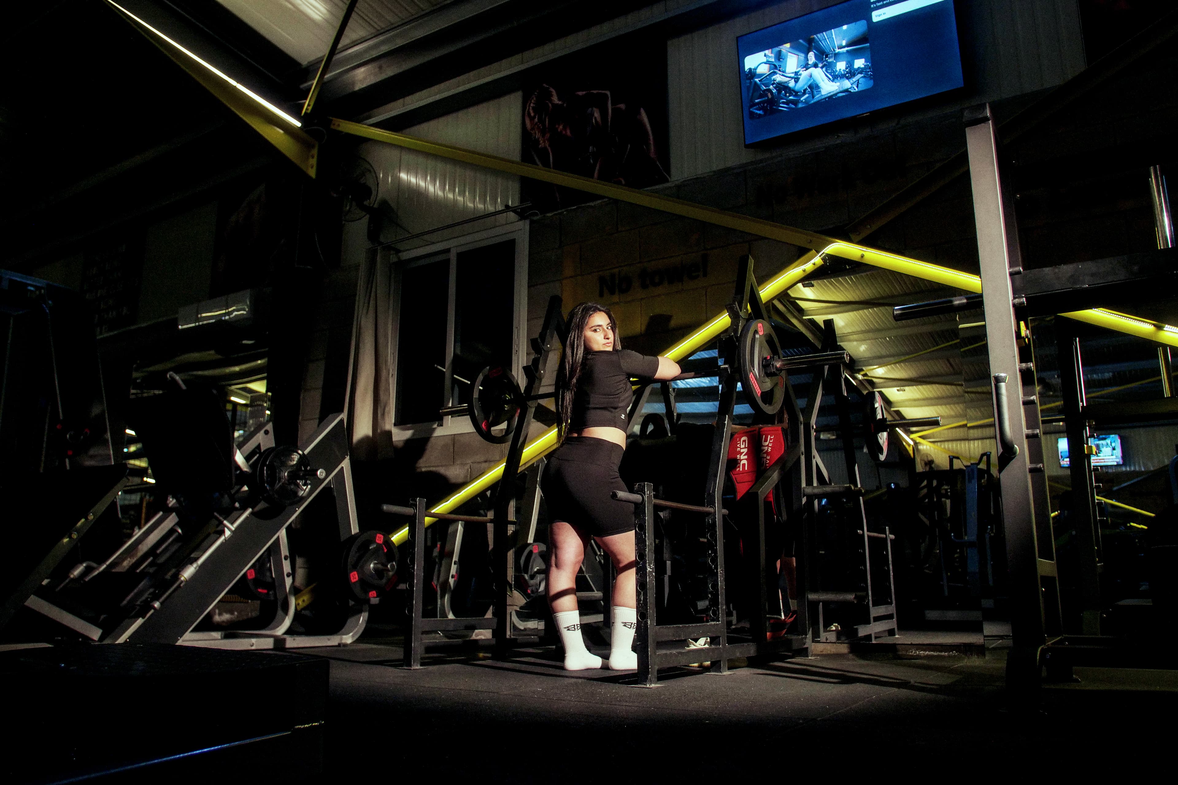 Bearbell athlete in the gym